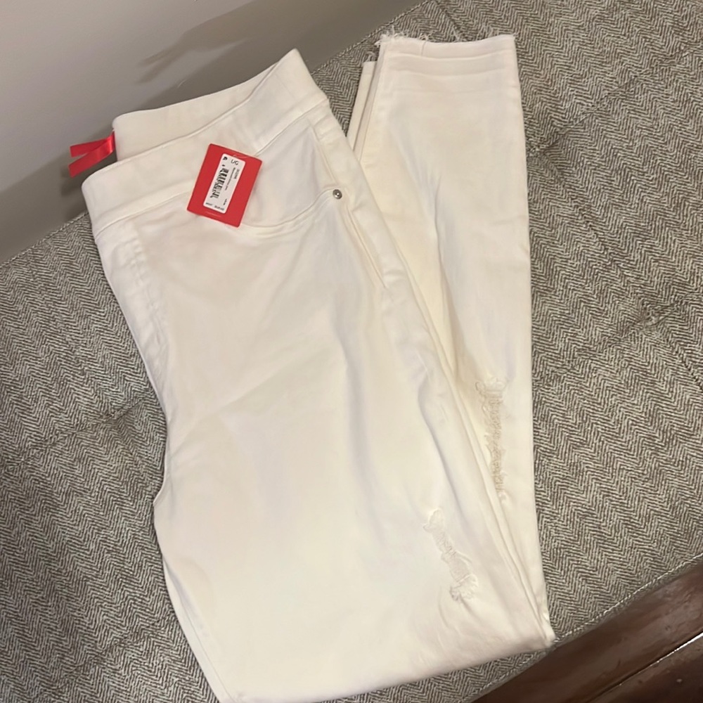 SOLD.  SPANX distressed skinny jeans size Large